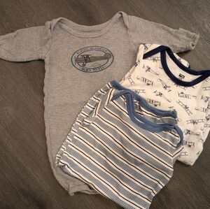Lot of 3 long sleeve bodysuits.